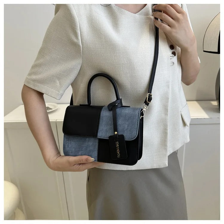 INÉS- BOLSO DE MANO VERSÁTIL Y ELEGANTE