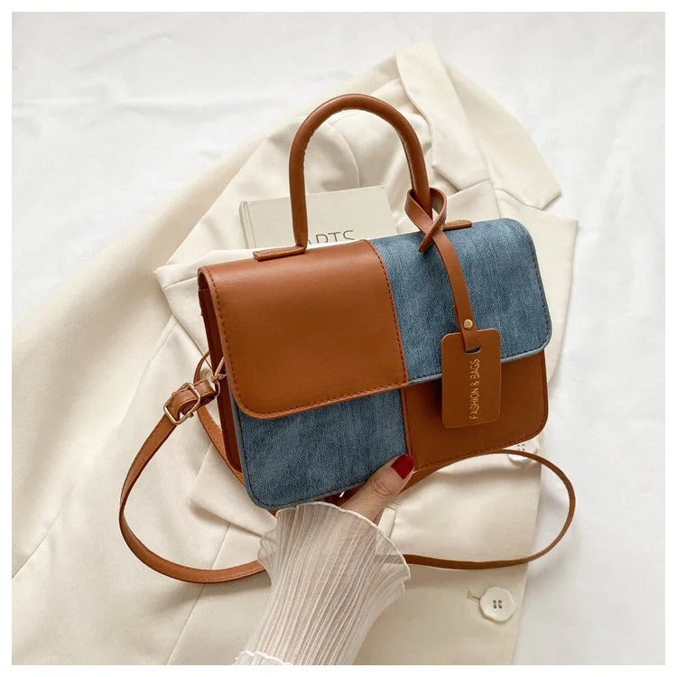 INÉS- BOLSO DE MANO VERSÁTIL Y ELEGANTE