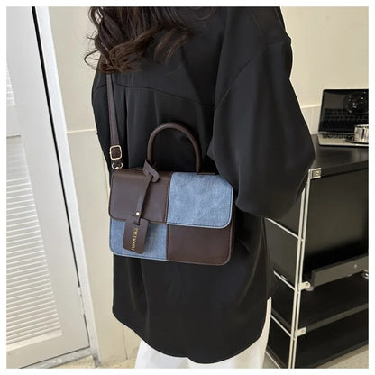 INÉS- BOLSO DE MANO VERSÁTIL Y ELEGANTE