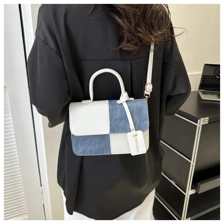 INÉS- BOLSO DE MANO VERSÁTIL Y ELEGANTE